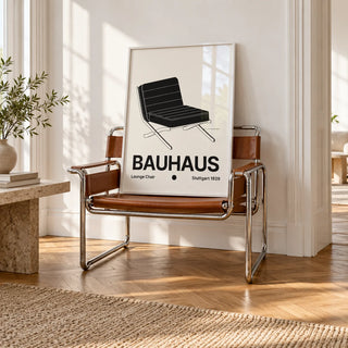 Bauhaus Chair Poster, framed on the wall of a bright white room with tall white walls and warm herringbone oak parquet in soft morning light in a living room