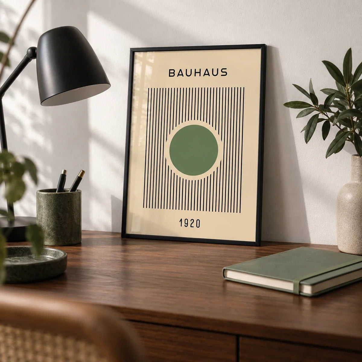 Bauhaus Poster, a small A4 framed print leaning on a walnut desk