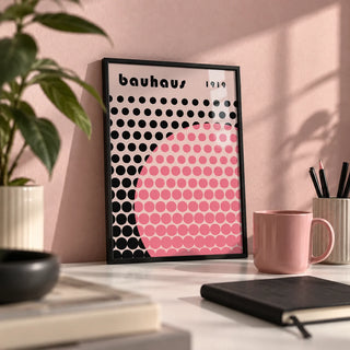 Bauhaus Print Poster, a small A4 framed print leaning on a white desk