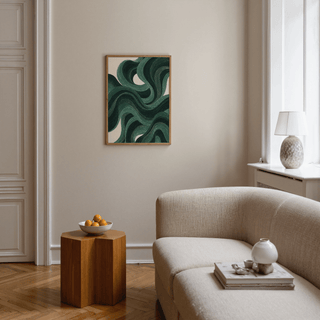 Modern Swirl Poster on wall with green abstract swirls above wooden side table with bowl in lounge