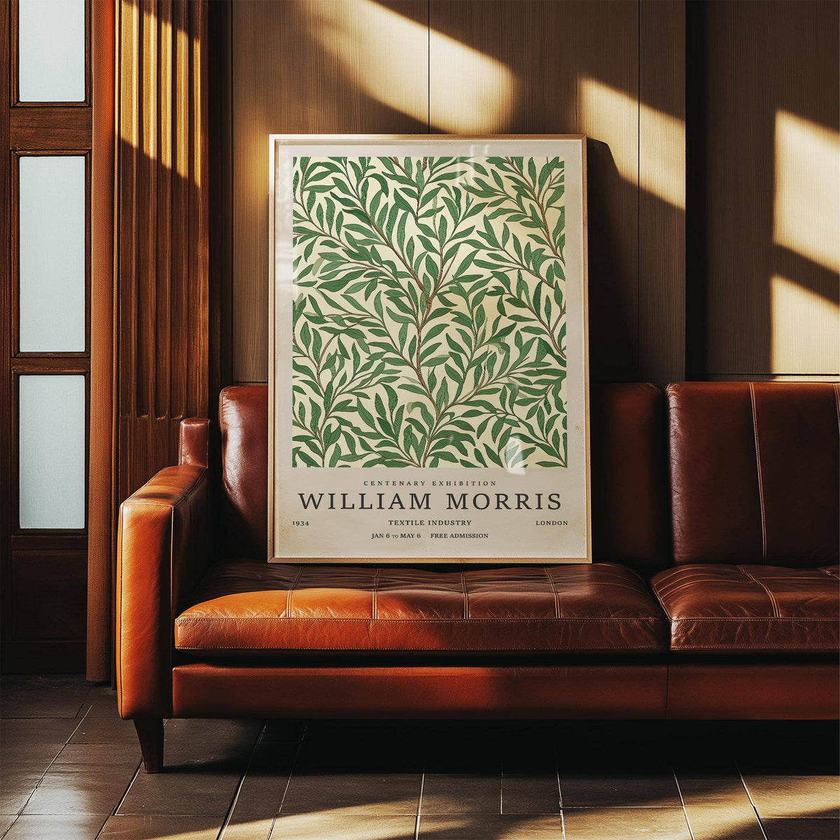 Classic Art Posters print leaning on a brown leather sofa with green willow branches and text