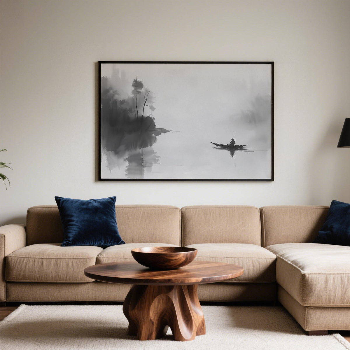 Japanese Fisherman Art print in black frame above beige sofa with blue cushions in living room