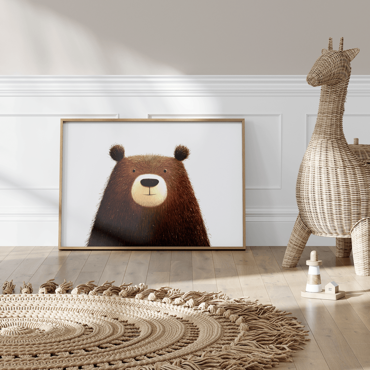 Cute Bear Art Print leaning on the floor with a woven giraffe toy and a textured jute rug