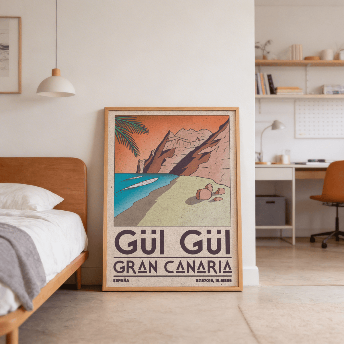 Gran Canaria beach art print leaning on the floor beside a bed in a bedroom with neutral tones