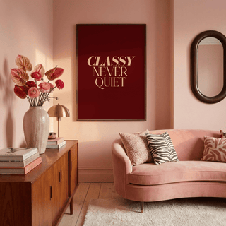 Print on a wall in a living room with Classy wall art in cream on dark red and a vase with pink flowers