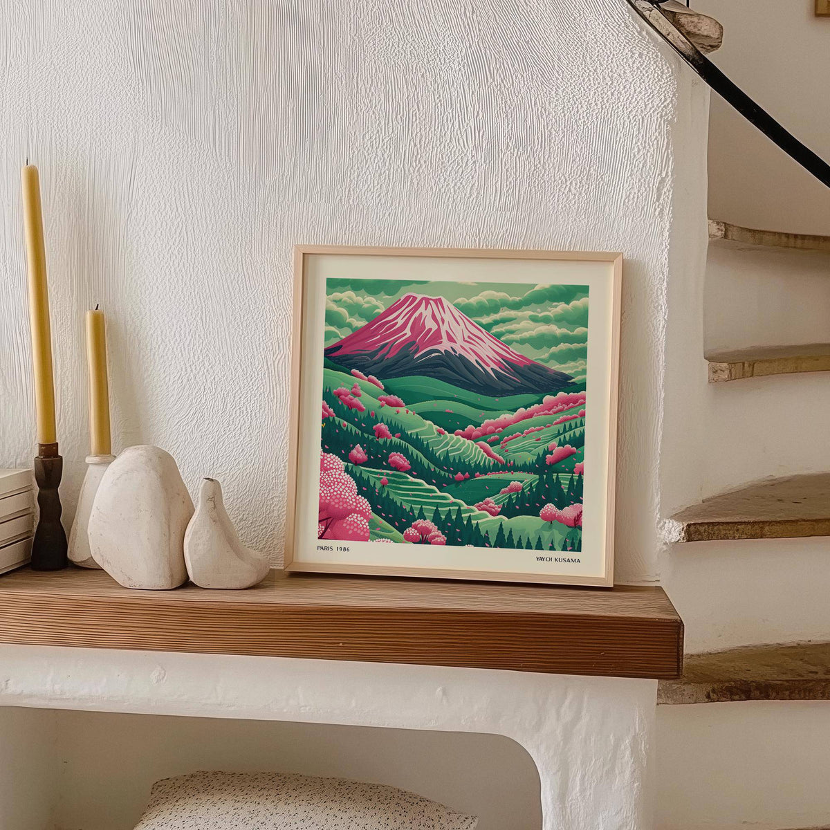 Mountain Landscape Art print leaning on a shelf with candles and decorative pottery nearby