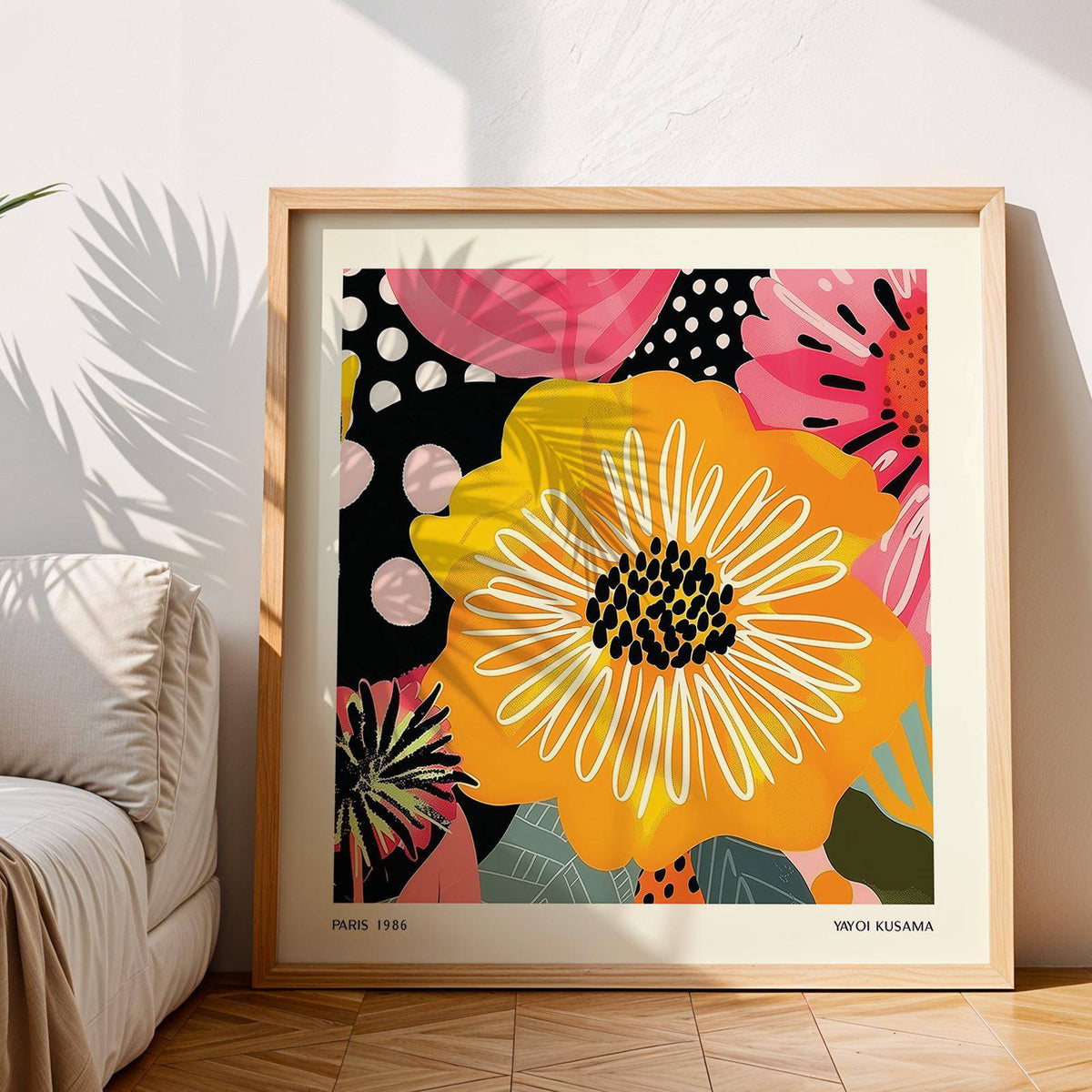 Framed Flower Posters print with a large yellow flower and abstract petals by a sofa