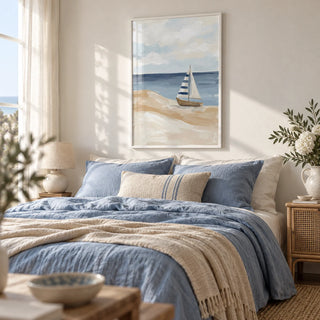 Beach Sailboat Wall Art, framed on the wall of a airy coastal bedroom