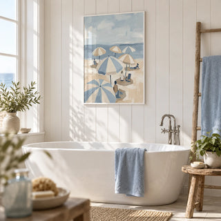 Beach Umbrella Art, framed on the wall of a bright seaside bathroom with white tongue-and-groove panelling
