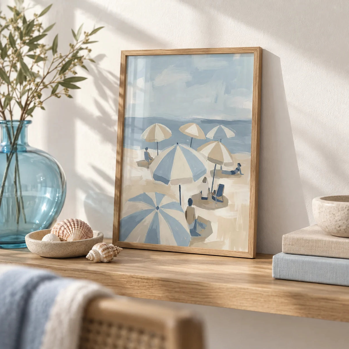 Beach Umbrella Art, a small A4 framed print leaning on an oak shelf in a living room