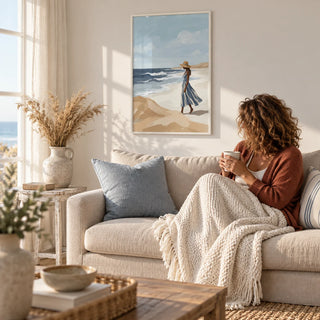 Beach Woman Art Print, framed on the wall of a light beach-house living room