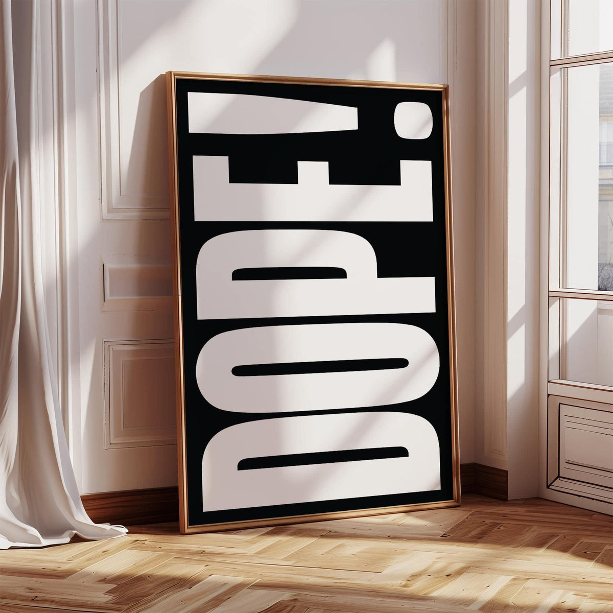 Bold Font Poster leaning against a wall with white typography on black background in natural light