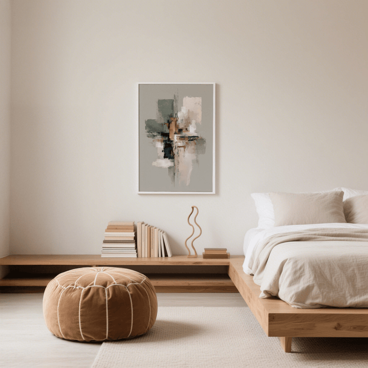 Wall Print Abstract framed print with muted green and pink shapes above a wooden bedside table in a bedroom