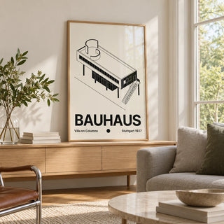 Black and White Architecture Poster, framed on the wall of a light living room with big windows