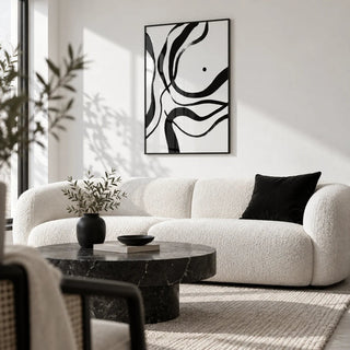 Black And White Art, framed on the wall of a modern monochrome living room