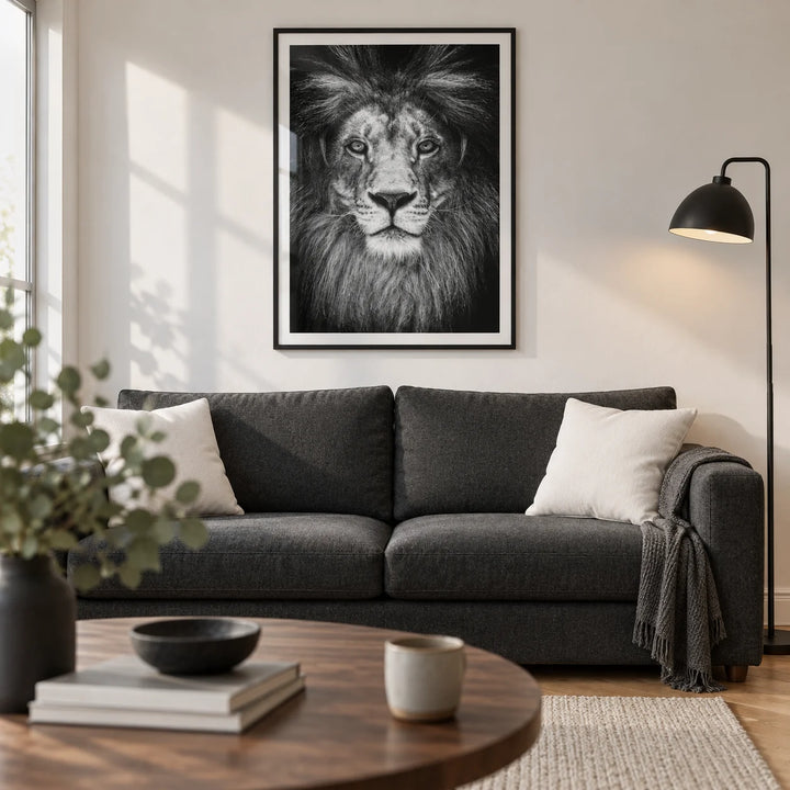 Black And White Lion Print, framed on the wall of a modern living room in a UK city flat with a soft white wall and oak floor
