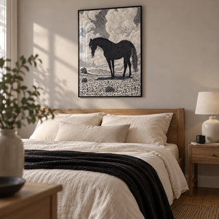 Black Horse Art Print, framed on the wall of a calm main bedroom in a UK home with a pale warm grey wall and oak floorboards