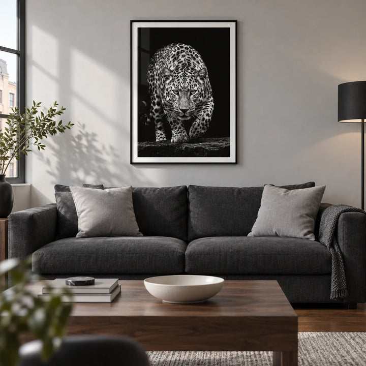 Black Leopard Wall Art, framed on the wall of a contemporary living room in a UK city flat with a pale grey wall and walnut floor