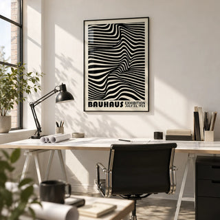 Black Minimalist Wall Art, framed on the wall of a crisp architect's studio with a white wall in a home office