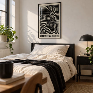 Black Minimalist Wall Art, framed on the wall of a young adult's bedroom in a first flat (22-28) with a white wall