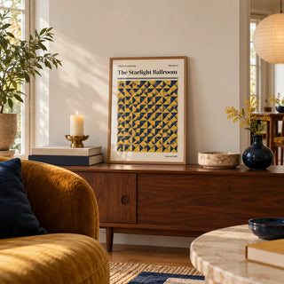 Blackpool Print, a small A4 framed print leaning on a walnut side table