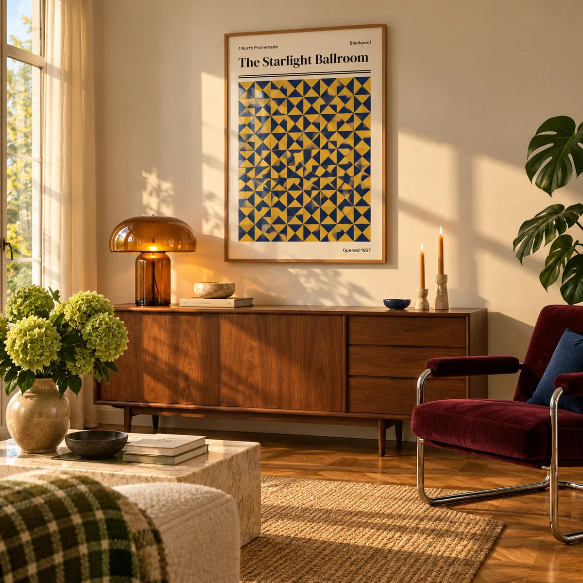Blackpool Print, framed on the wall of a warm mid-century living room in late afternoon light