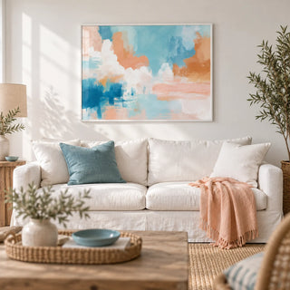 Blue Pink Abstract Painting, framed on the wall of a calm coastal living room with a white wall