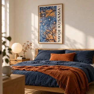 Blue Wall Art for Living Room, framed on the wall of a quiet bedroom with a warm white wall