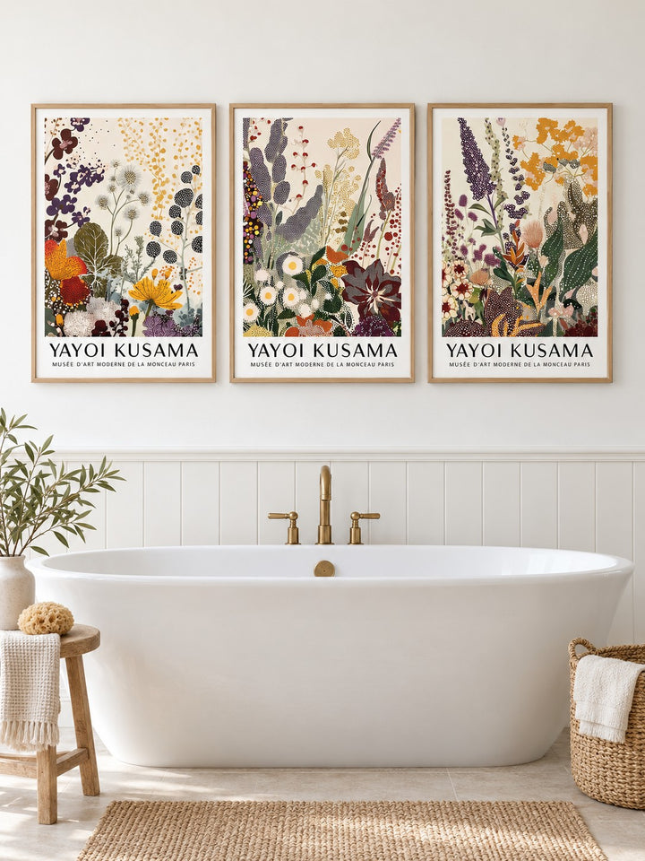 Botanical Prints Set hung at eye level above a freestanding bath: Earthen Bloom, Garden Motion and Verdant Dots shown framed side by side (frames not included)