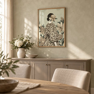 Botanical Portrait Painting, framed on the wall of a soft dining room