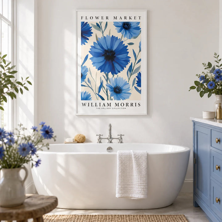 Botanical Print, framed on the wall of a fresh bathroom with plain white walls and a plain cornflower blue painted vanity