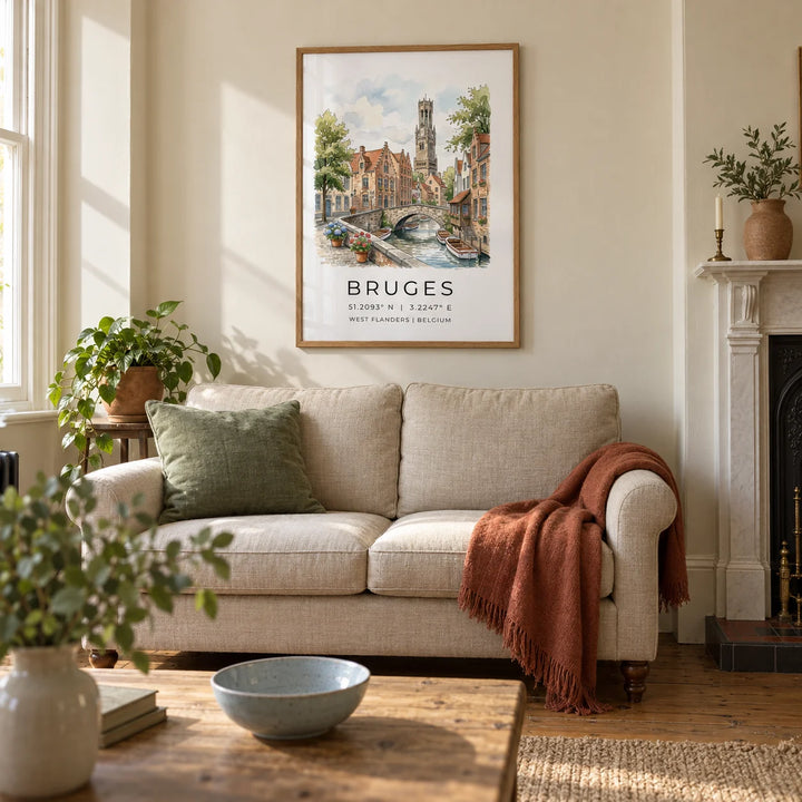 Bruges Canal Art Print, framed on the wall of a welcoming living room in a Victorian UK terrace with warm ivory plaster walls