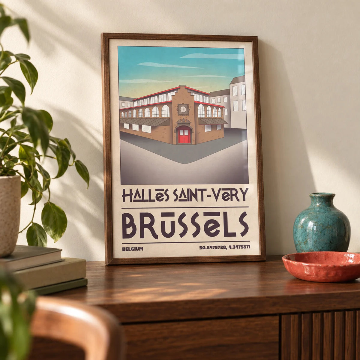 Brussels Architecture Art Print, a small A4 framed print leaning on a walnut sideboard in a living room