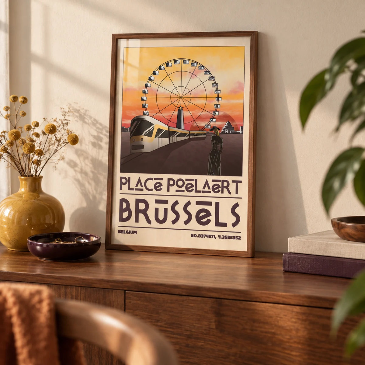 Brussels Cityscape Art Print, a small A4 framed print leaning on a walnut sideboard in a living room