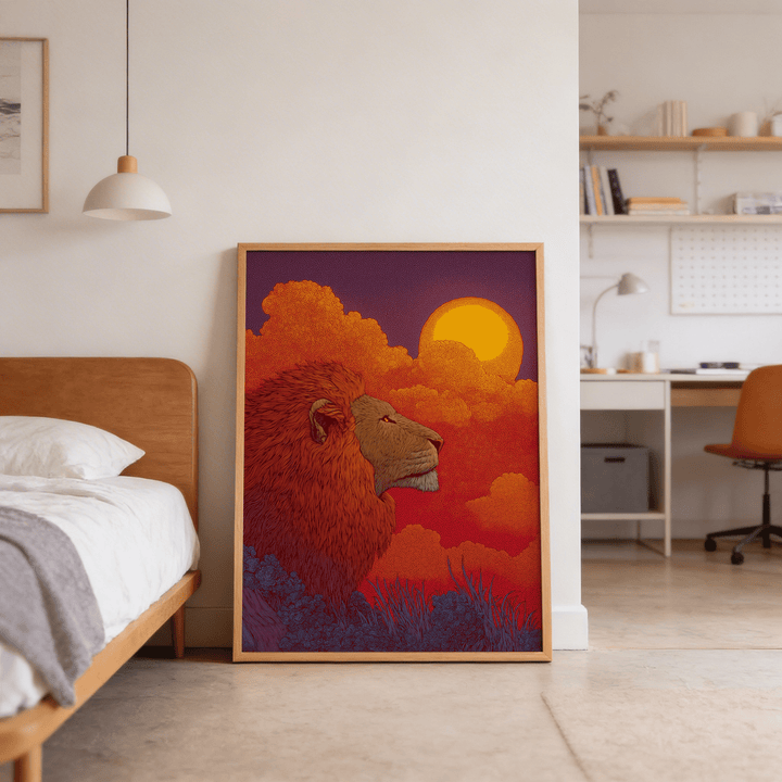 Print leaning on the floor of a bedroom showing a red lion profile with an orange sun and clouds