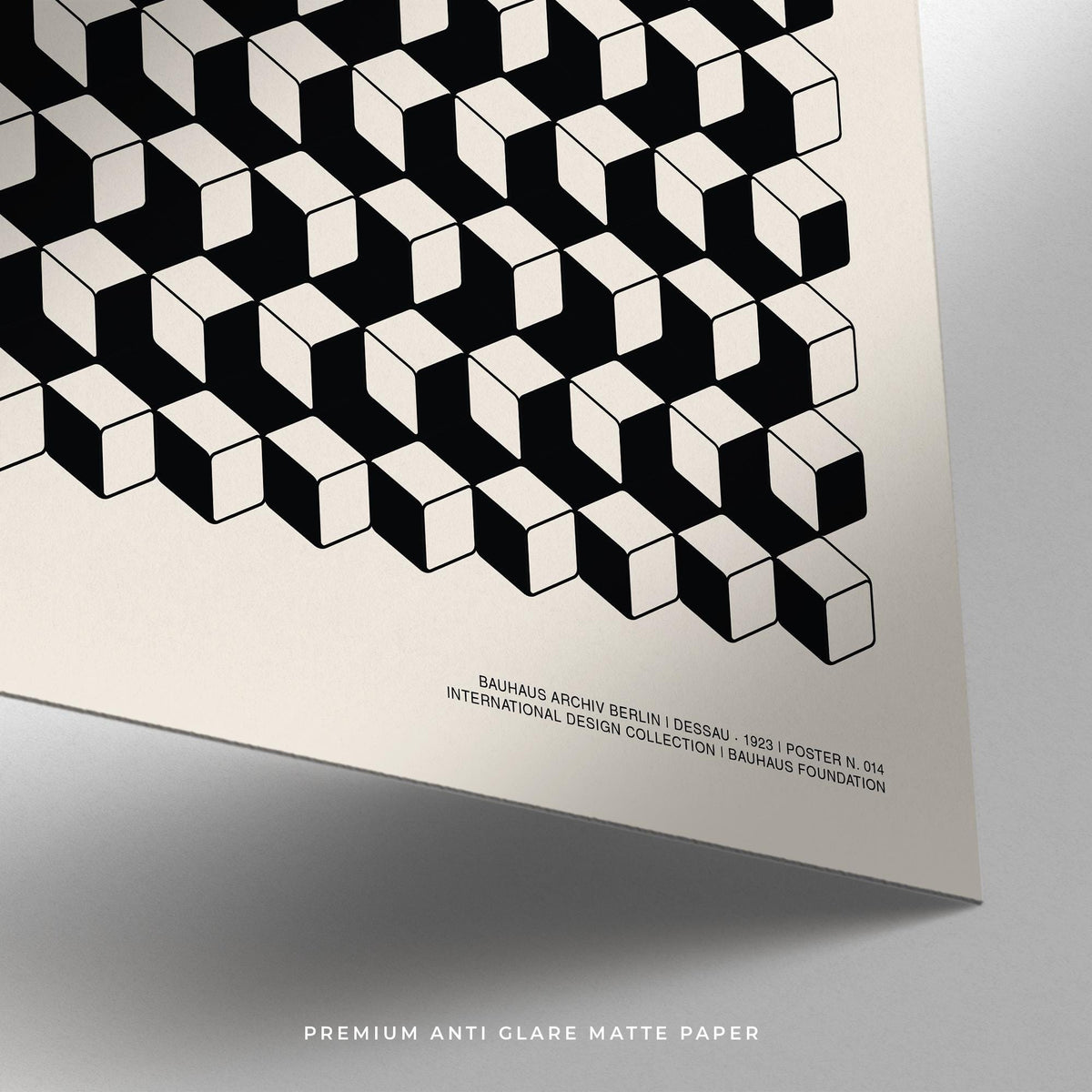 Detail close-up of Bauhaus Design wall art showing black and white cubes and text on matte paper