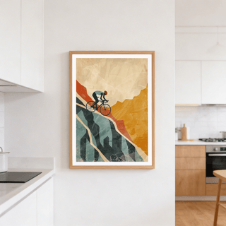 Mountain Biking Art Print of an abstract cyclist climbing a hill in muted orange and blue hues in a kitchen