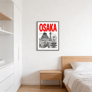 Framed Osaka City Print with black line-art and red text above a wooden bedside table in a bedroom