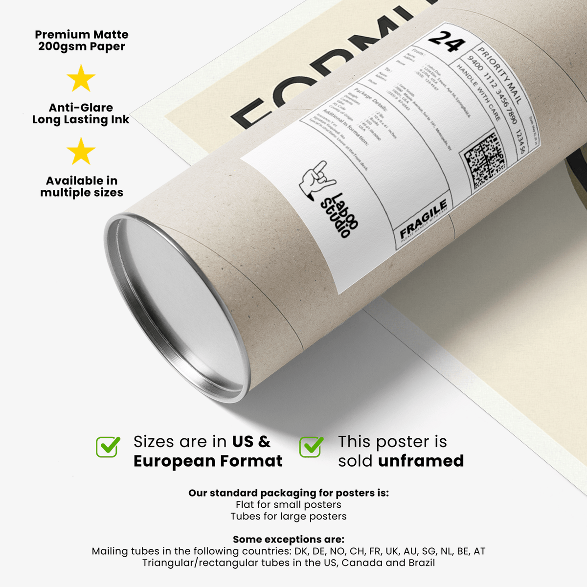 Packaging tube with a shipping label resting on the folded Brazilian race circuit poster with beige and black colours