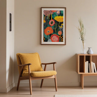 Beautiful Flower Art print with colourful abstract flowers in a frame above a yellow armchair