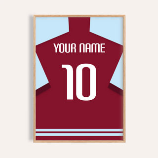 Framed print close-up of a plain claret football shirt with a white number and name