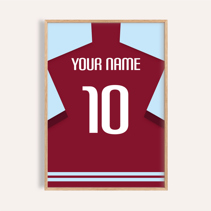 Framed print close-up of a plain claret football shirt with a white number and name