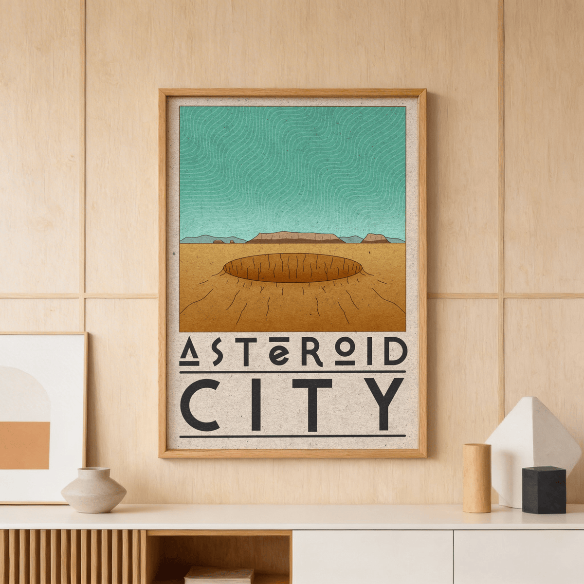 Retro Desert Sci-Fi Poster print of a minimalist desert crater in turquoise and brown above a sideboard with a vase