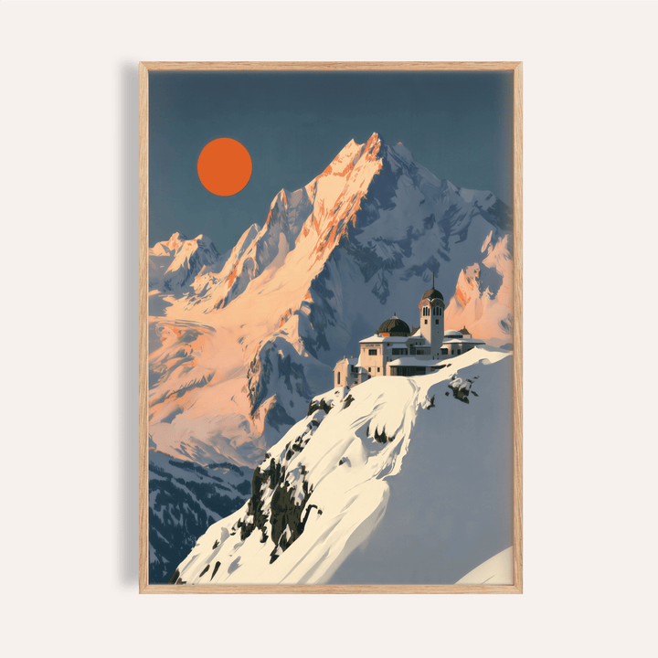 Framed Art Deco Mountain Poster with snowy alpine peak and orange sun on cream wall