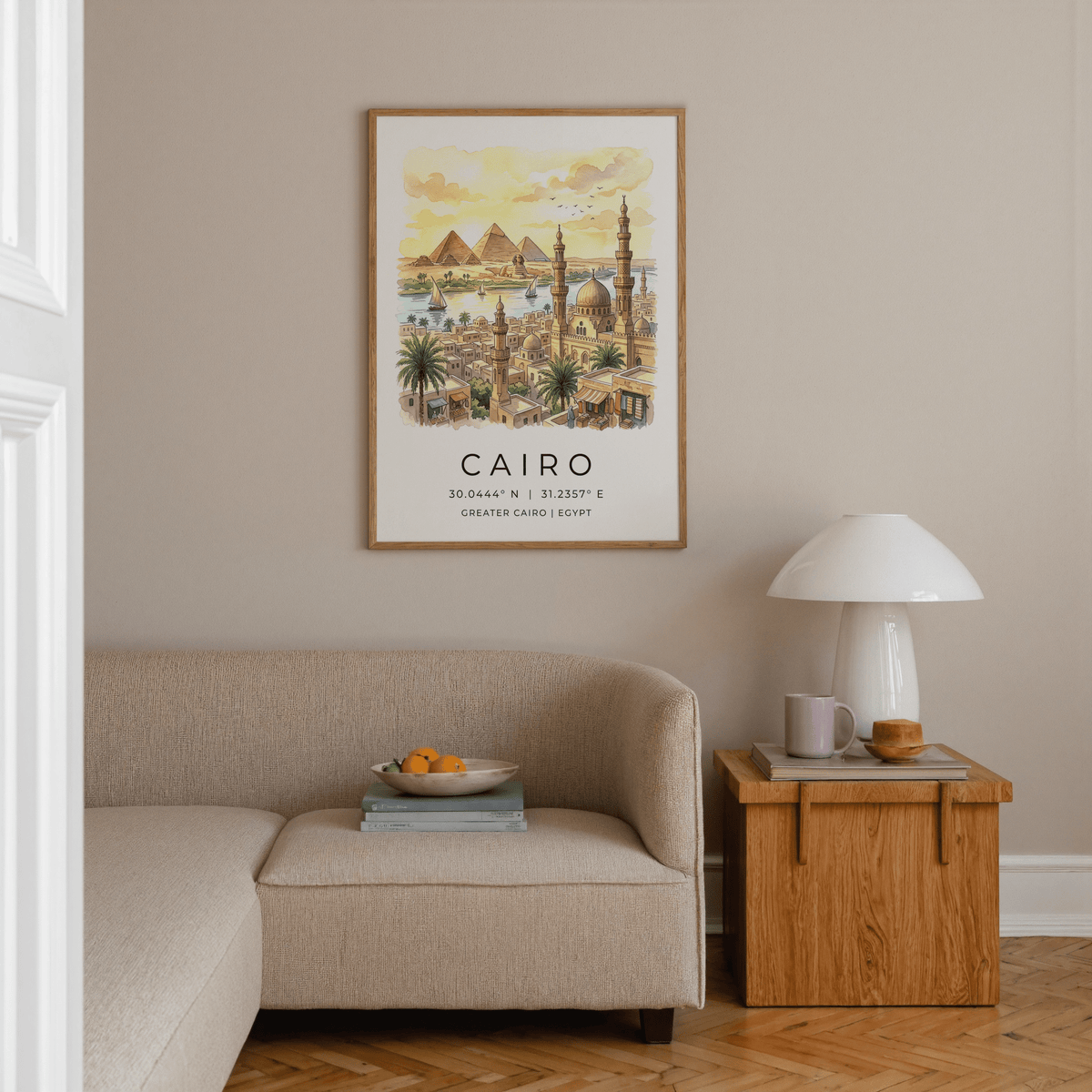 Cairo landscape wall art in soft watercolour hues above a beige sofa in a living room