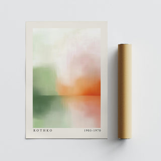 Peaceful wall art lying flat with an abstract sunset in soft green and orange tones alongside a packaging tube