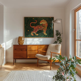 Oriental wall art of a golden tiger on dark green with gold details above a mid century sideboard