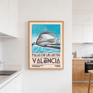 Valencia Architecture Print on white wall with wooden frame showing blue sky and grey building in kitchen