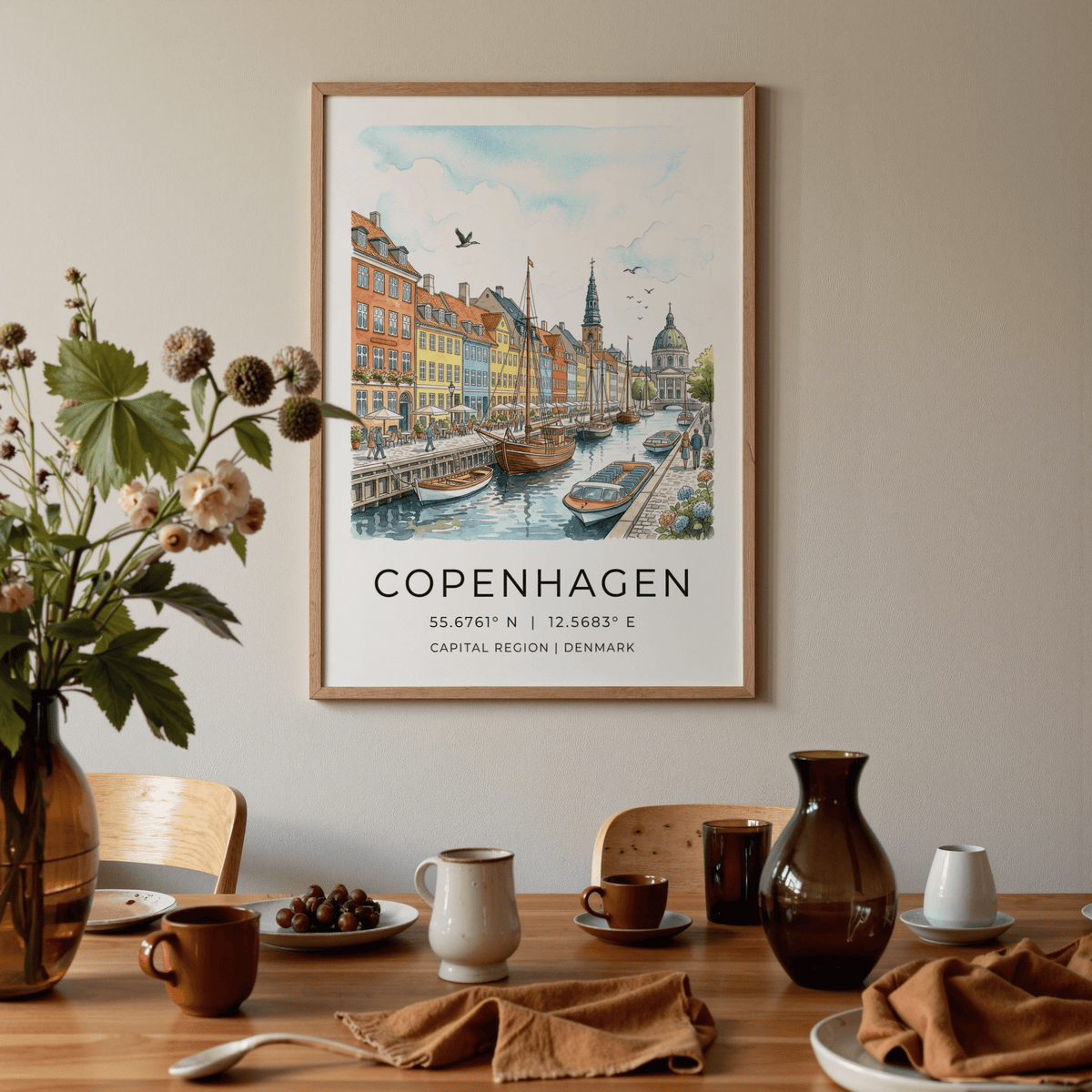 Print of Copenhagen Canal wall art with boats and colourful buildings above a dining table with brown crockery