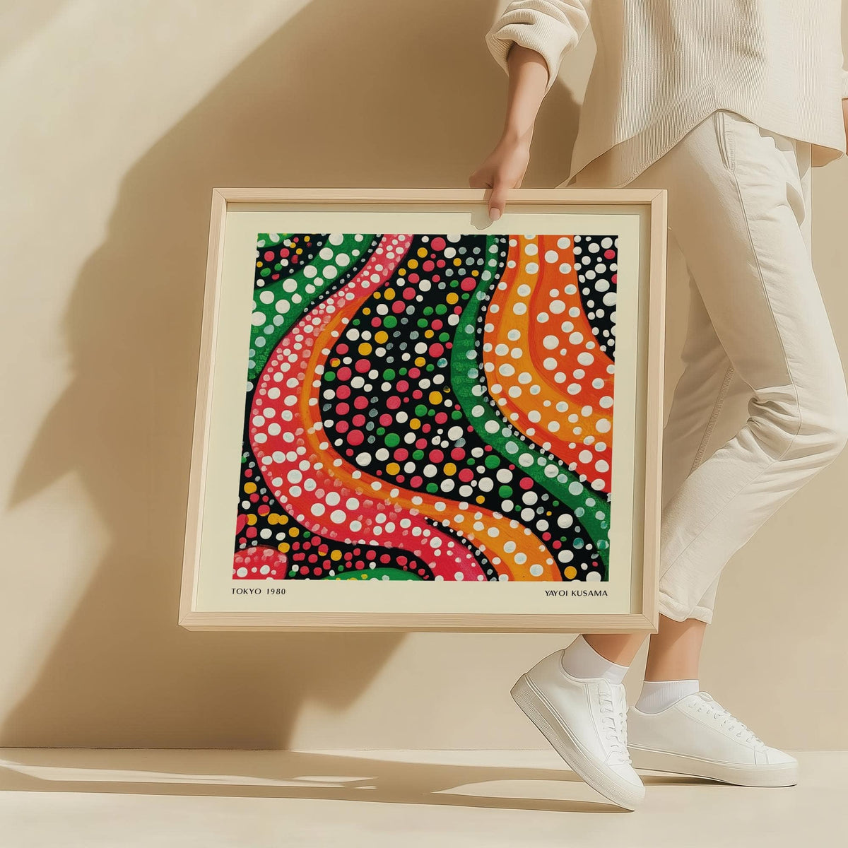 Abstract Colorful Art framed print with vibrant wavy lines and dots held in hands